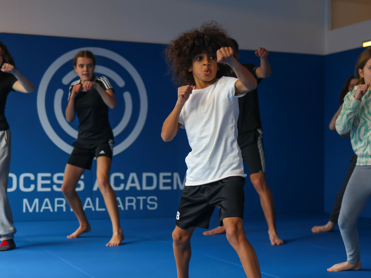 Kinder beim Selbstverteidigungstraining in der Process Academy Stuttgart